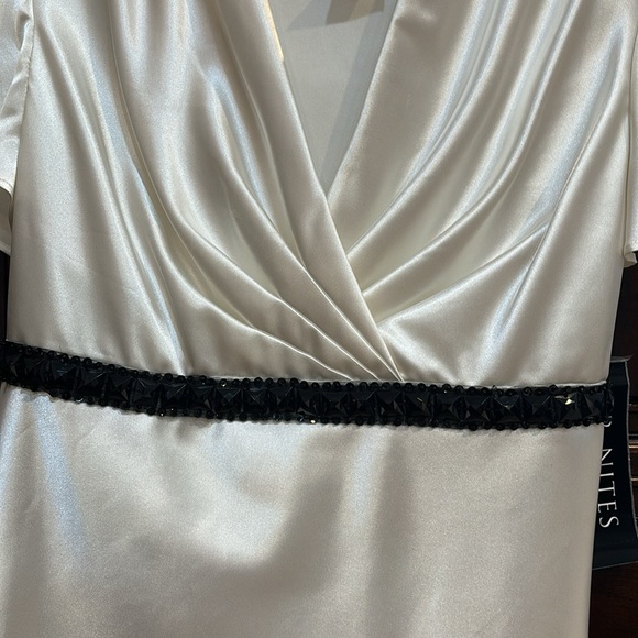 Ivory and black stretch satin top with black beads tucked under bust. Size 10 - Picture 3 of 6